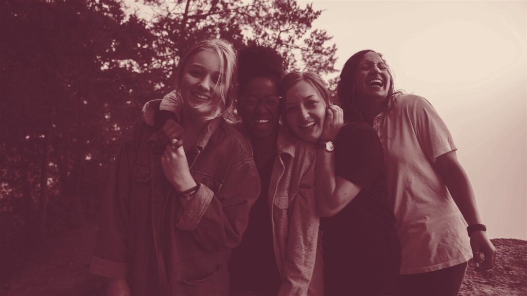 Women laughing together outdoors