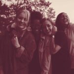 Women laughing together outdoors